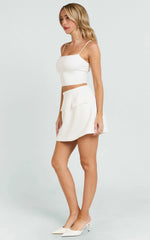 White Tulip Shape Pocket Flap Mini Skirt